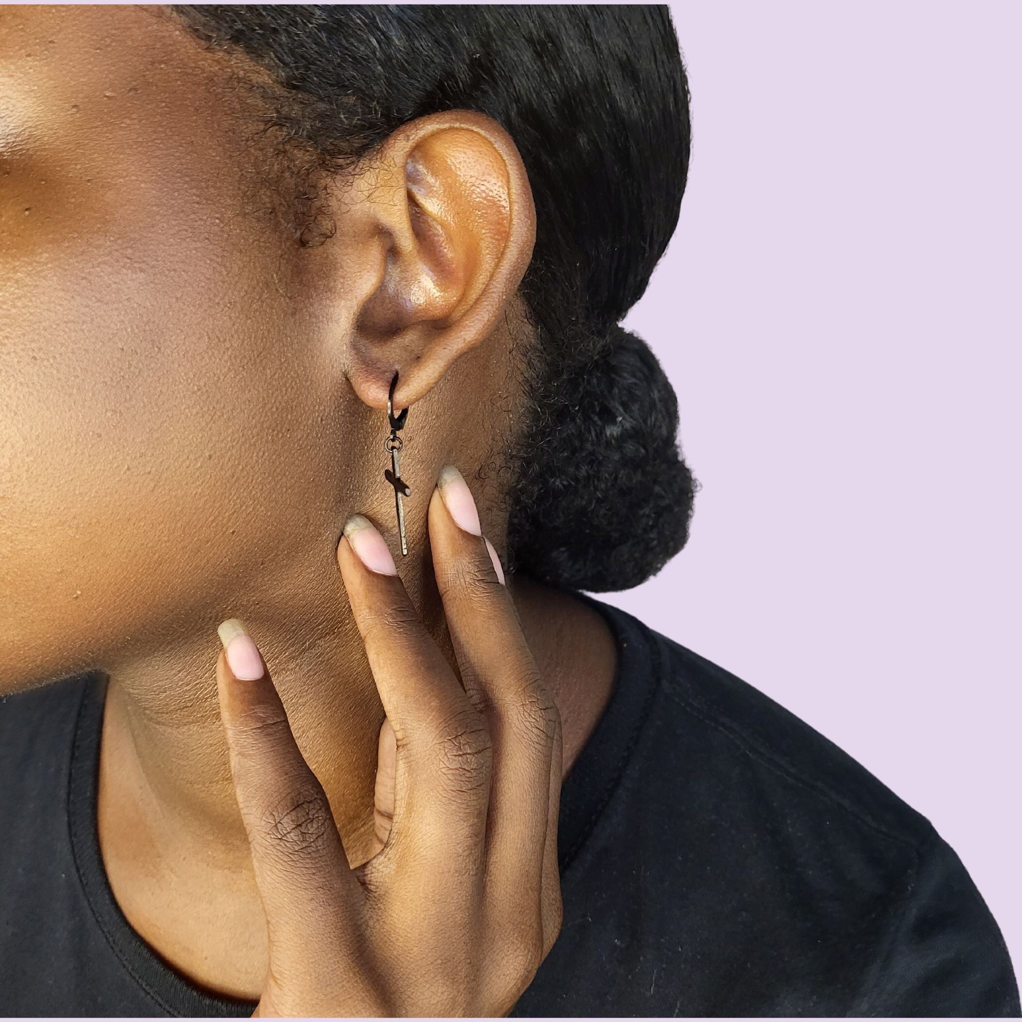 Exploring the Symbolism of Black Cross Dangle Earrings: A Fashion Stat