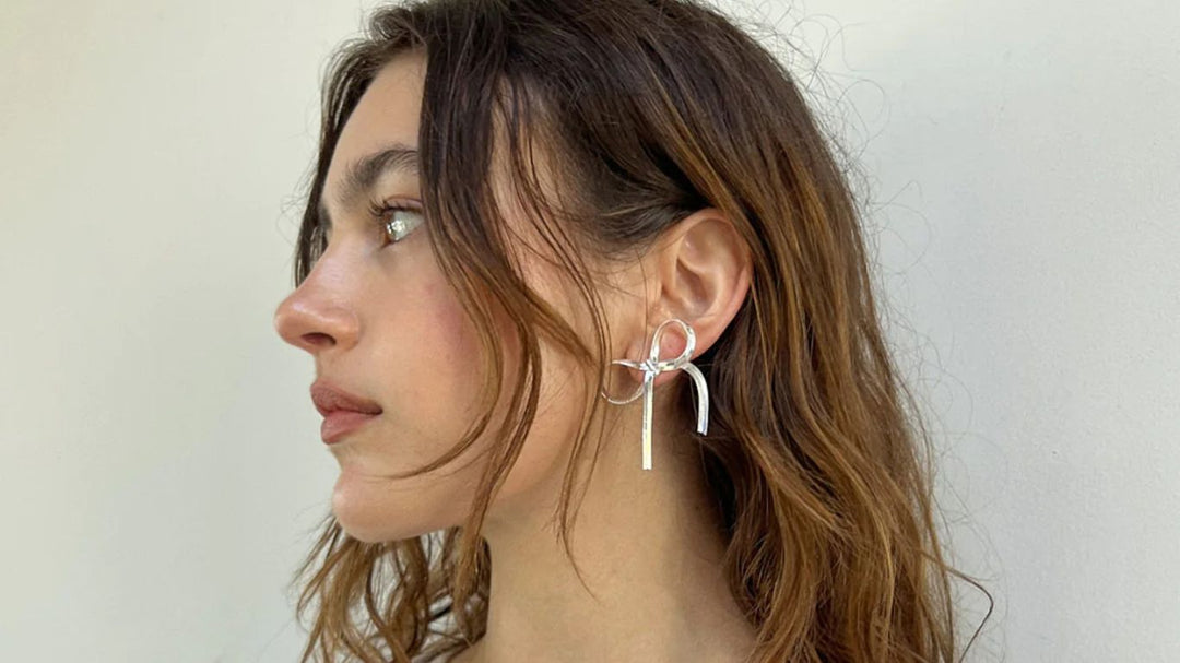 bow statement earrings for self-love