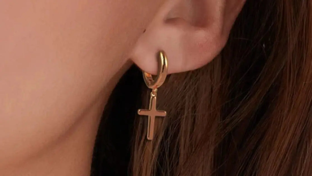 Elevate Your Style with Grace: The Allure of Dangling Cross Earrings