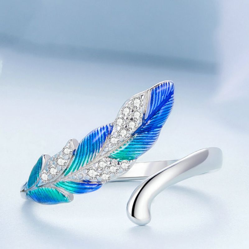 feather earrings and ring