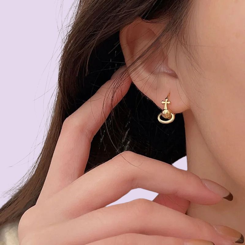 gold saturn earrings