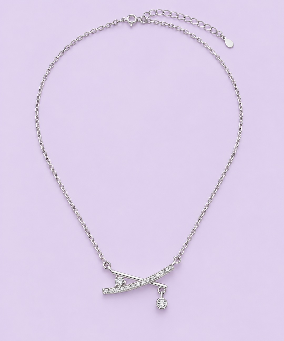 X-Cross Studded Pendant Necklace full chain on lavender studio background