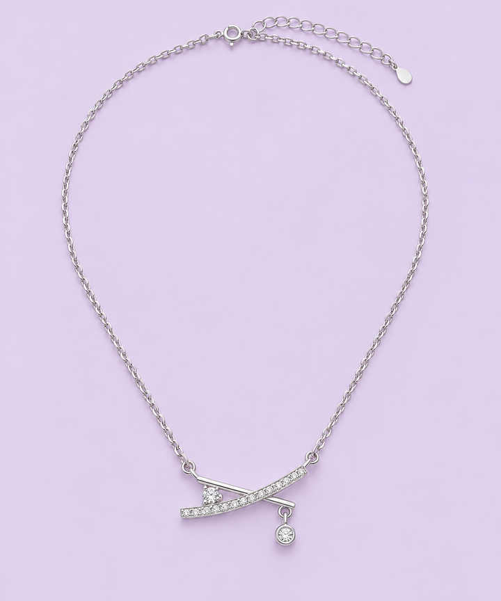 X-Cross Studded Pendant Necklace full chain on lavender studio background